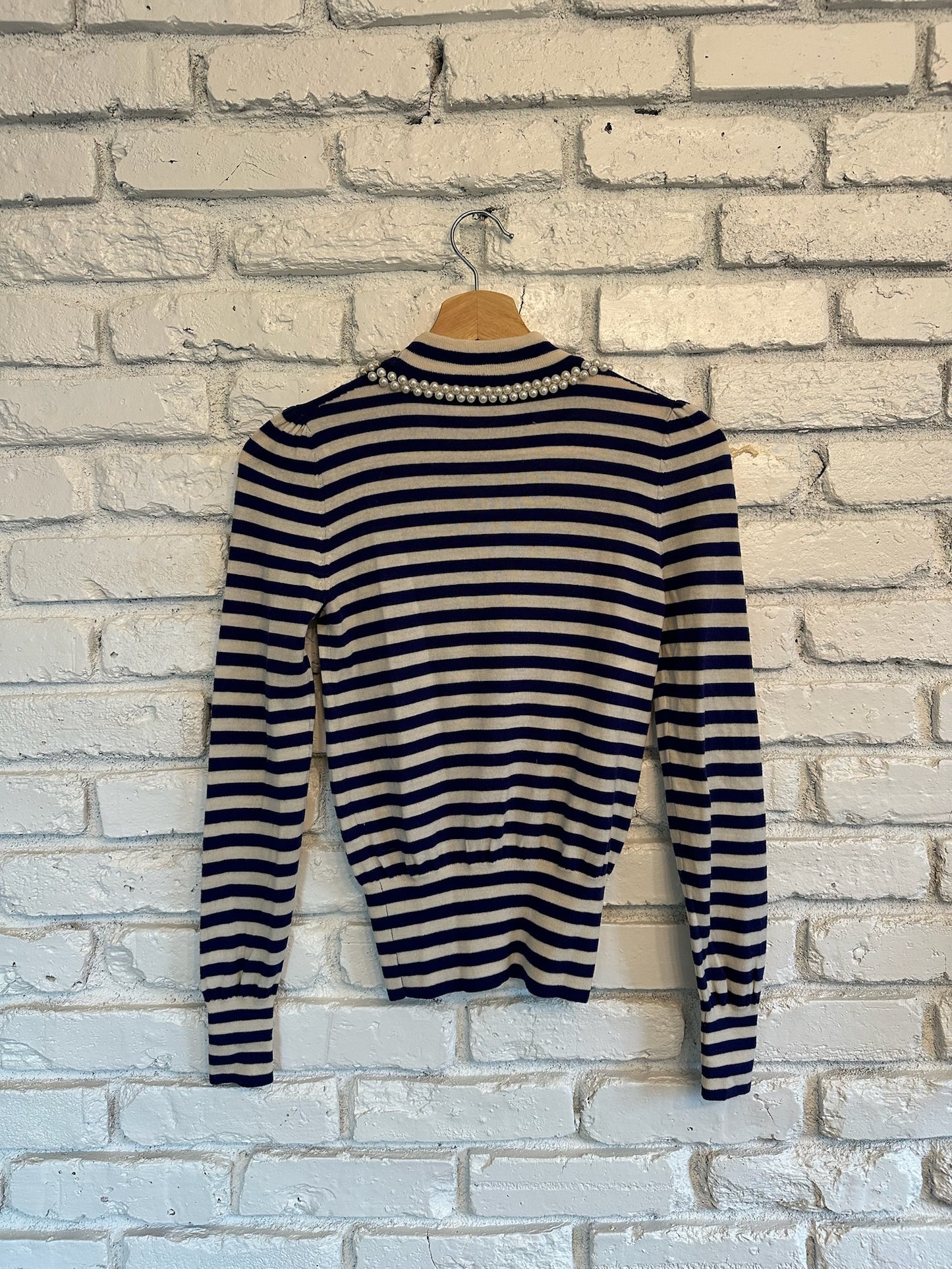 The Giselle Moschino Striped Sweater