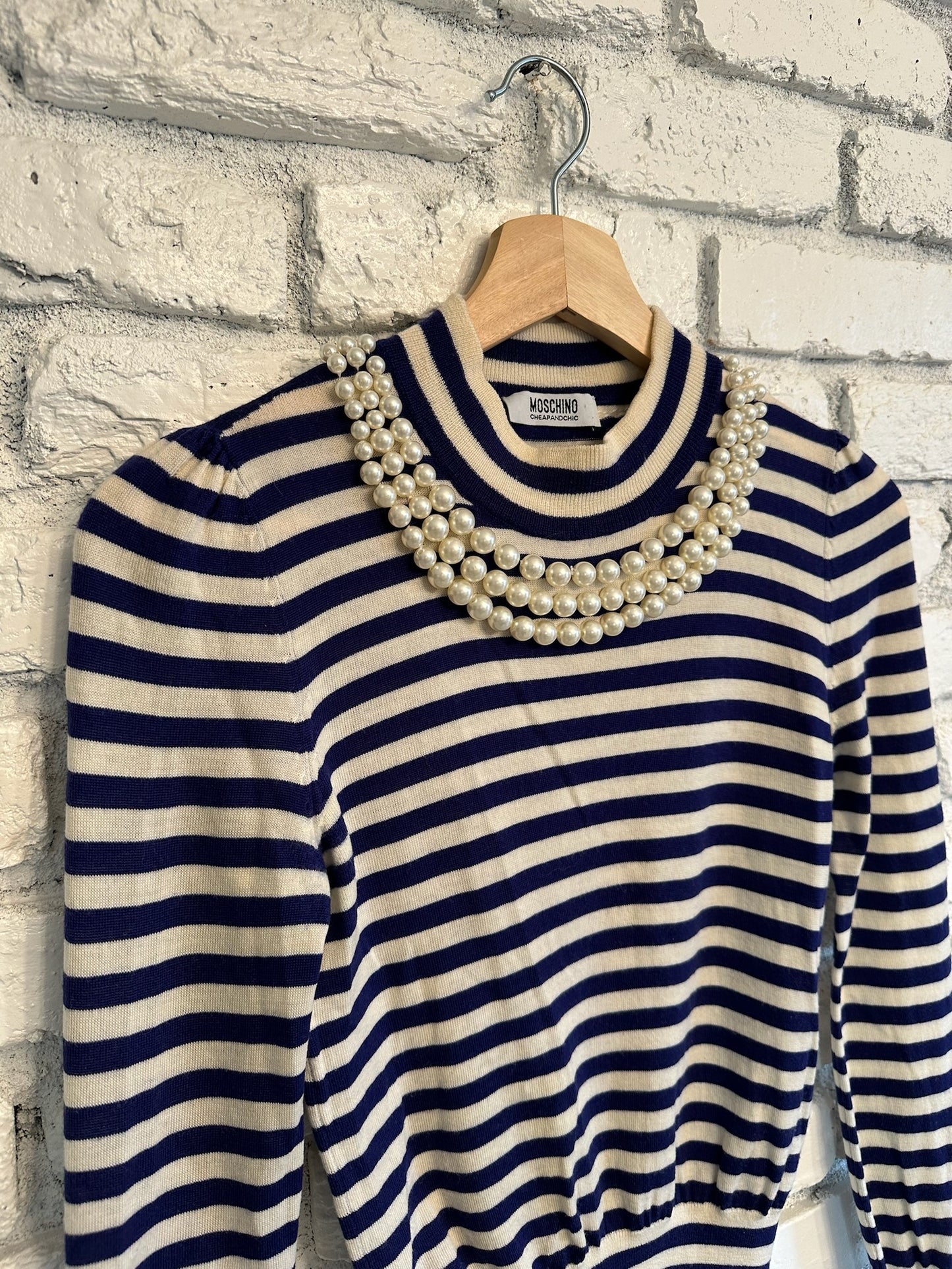 The Giselle Moschino Striped Sweater